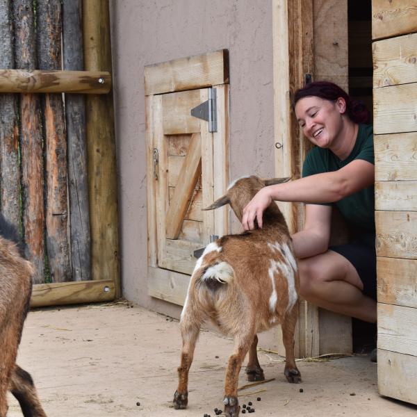 Keeper with goat